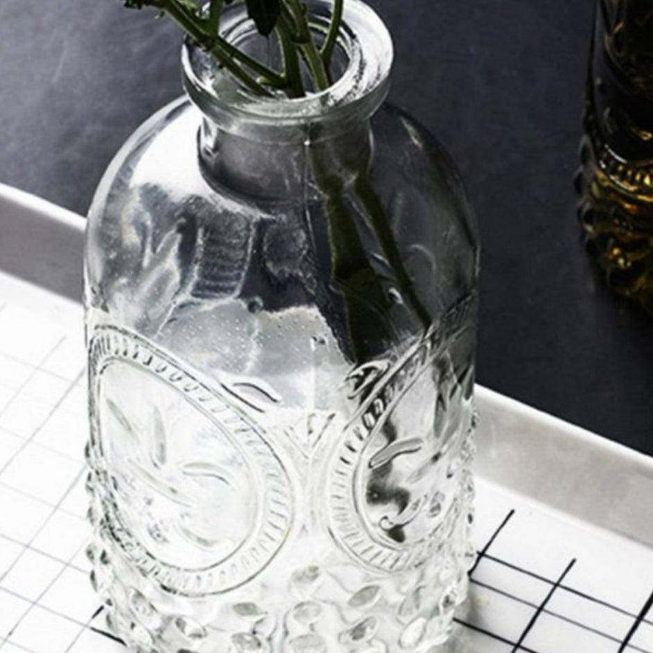 Vintage Embossed Clear Glass Bottle